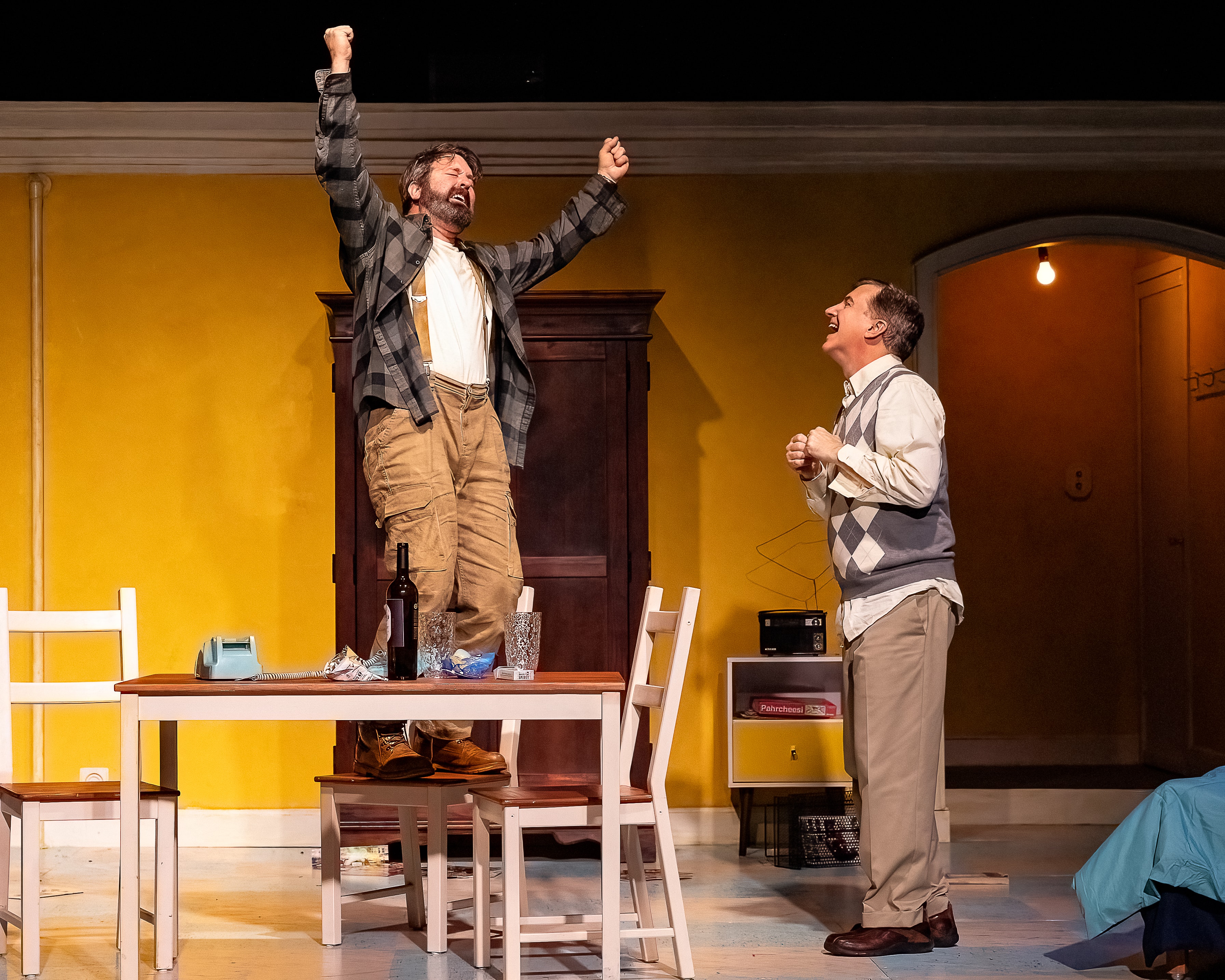 Elling 2023 — man celebrating on table during theater performance